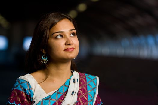 Attractive indian lady in traditional costume saree celebrating deewali religious festival of india