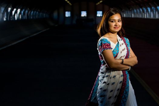 Attractive indian lady in traditional costume saree celebrating deewali religious festival of india