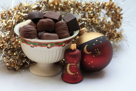 Luxury chocolates and christmas decorations