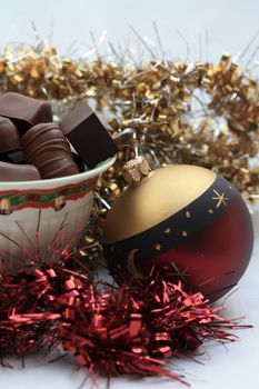 Christmas bowl with chocolates and decoration