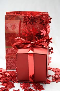 Christmas gifts with red wrapping and christmas decorations