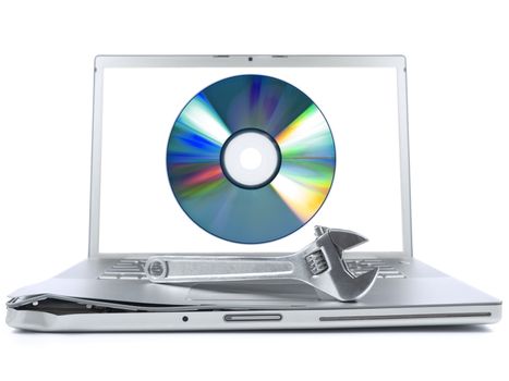 Damaged laptop with a spanner over it and a digital disc on the screen. Isolated on white.