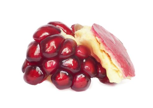 Extreme close up background of a red juicy ripe pomegranate fruit seeds 