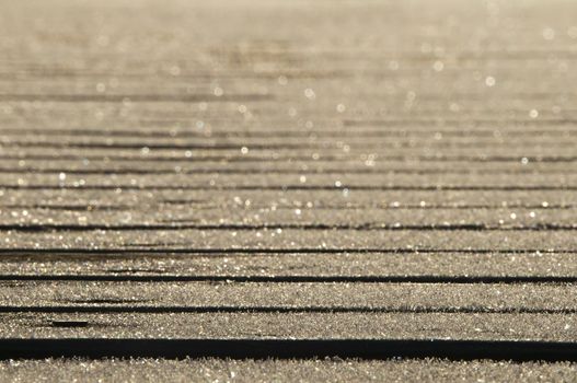 closeup of a footbridge with ice crystals