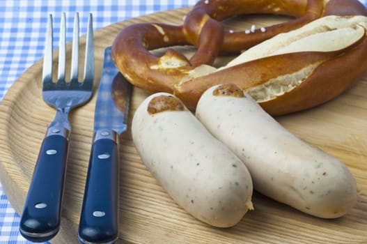 veal sausage with pretzel and sweet mustard