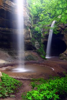 Waterfalls flow into Tonti Canyon on a spring day at Starved Rock State Park.