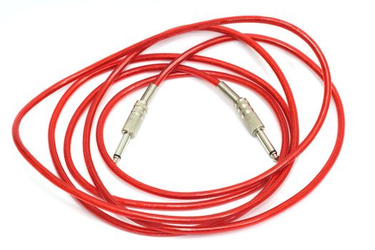 Electric guitar patch cable isolated on white 