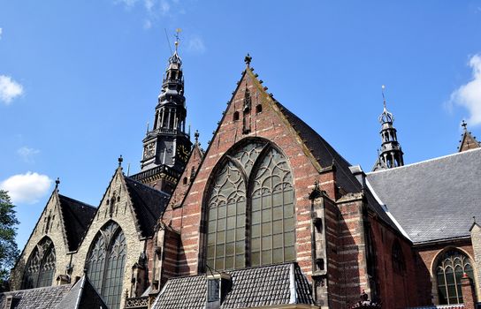 Oude kerk, details of bell tower in Amsterdam city.