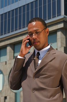 An confident and successful African-American businessman in a power suit