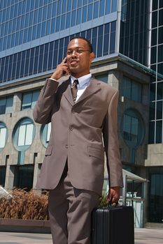 An confident and successful African-American businessman in a power suit