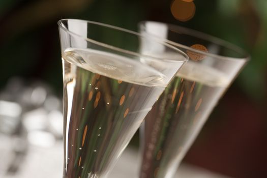 Champagne Glasses Abstract with Sparkling Lights in the Background.
