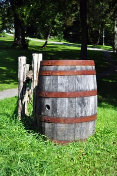 Old wood barrel abandoned in rural area