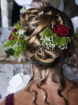 Detail of hairstyle and curls on a bridal hairdo