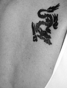 Chines dragon tattoo on a woman's back 
