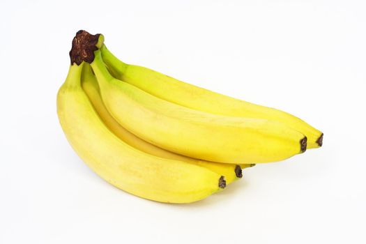 Photo of a sheaf of bananas on a white background 