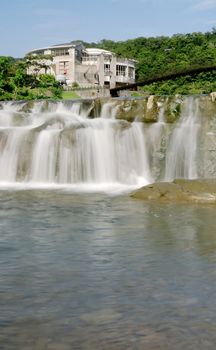 It is a beautiful waterfall from the river.