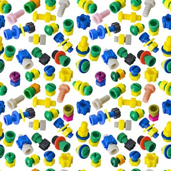 Seamless texture - color toy nuts and bolts on white