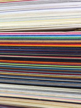 Colored samples of different papers on white background