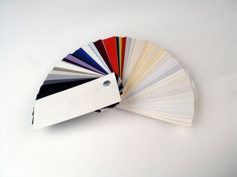 Colored samples of different papers on white background