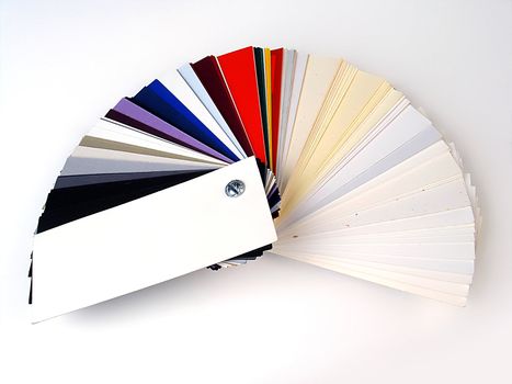 Colored samples of different papers on white background