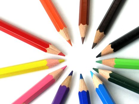 Colored Pencils in a Row on white background