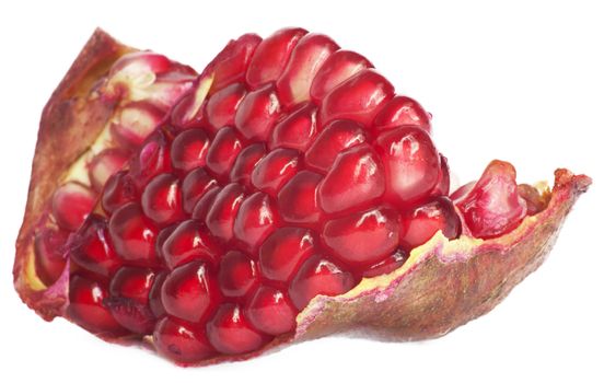 Extreme close up background of a red juicy ripe pomegranate fruit seeds 
