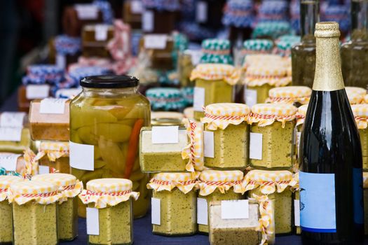 Harvest of the summer catched in jars and bottles for sale