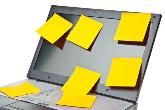 Laptop notebook isolated on white with postits on it