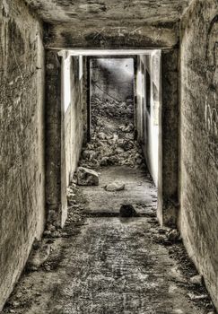 Entrance down to a derelict bunker shot in HDR