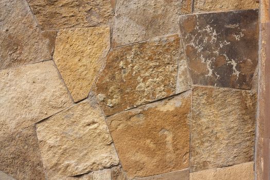 Unshaped stone wall pattern,wall made of rocks 