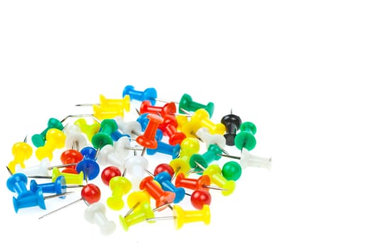 isolated colorful pushpins focus at red