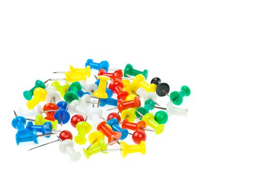 isolated colorful pushpins focus at yellow