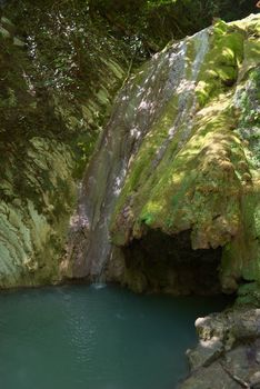 photo of the beautiful waterfall in tropical forest