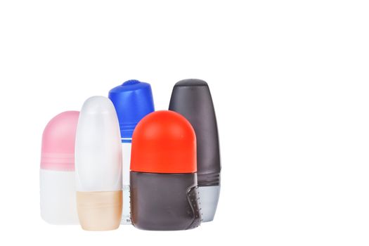 Colorful deodorant on white background