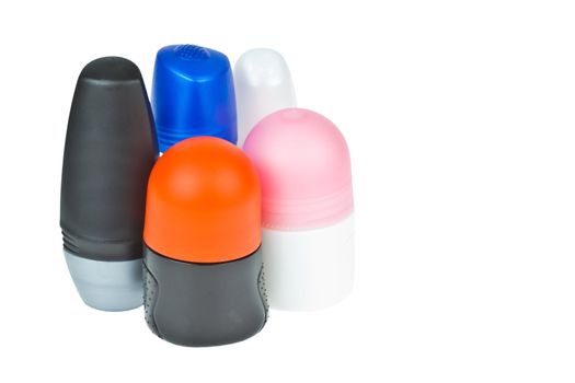 Colorful deodorant on white background