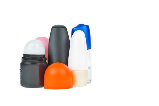 Colorful deodorant on white background