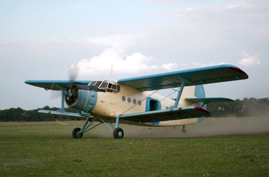 Old style plane flies up to sky