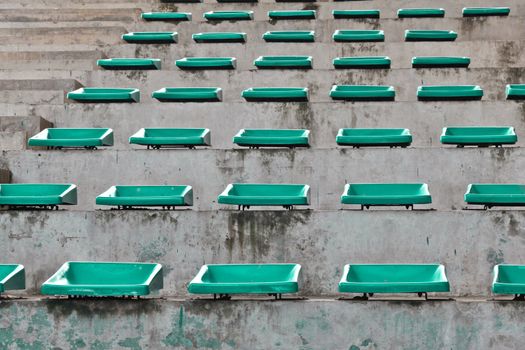 old plastic blue seats on stadium