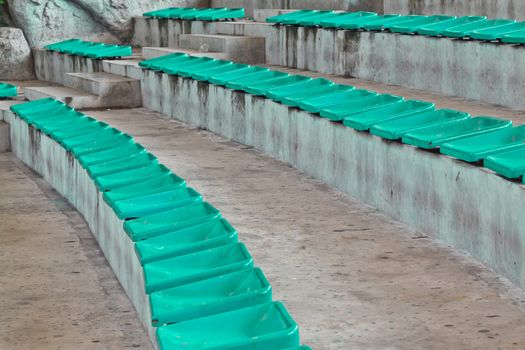 old plastic blue seats on stadium