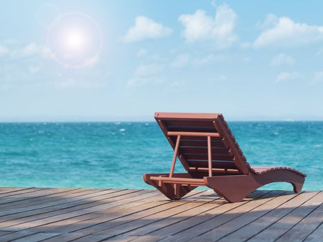 Empty beach chair at a resort facing the south China sea in Pulau Besar Malaysia