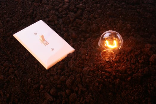 The electric socket against a ground - a symbol of an alternative energy source.