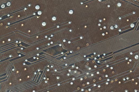 The printed-circuit board with electronic components macro background