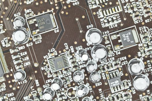 The printed-circuit board with electronic components macro background