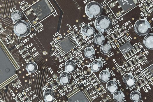 The printed-circuit board with electronic components macro background