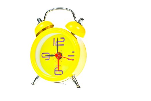 Clock, Yellow clock, showing nine o'clock, Isolated