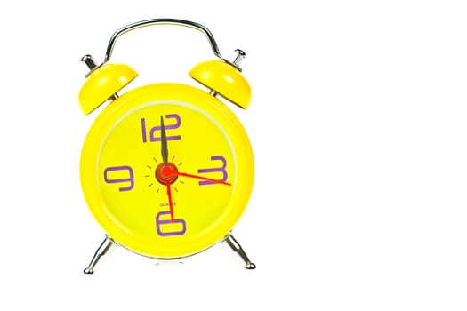 Clock, Yellow clock, showing nine o'clock, Isolated