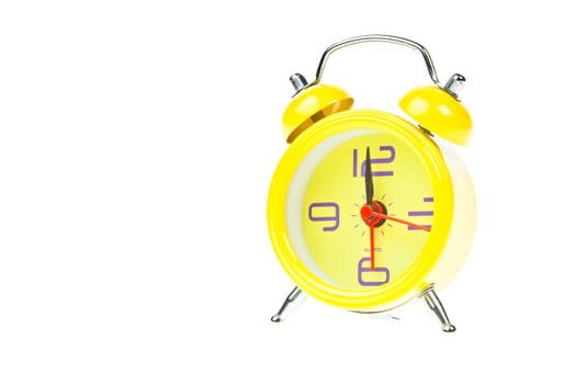 Clock, Yellow clock, showing nine o'clock, Isolated