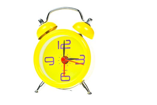 Clock, Yellow clock, showing nine o'clock, Isolated