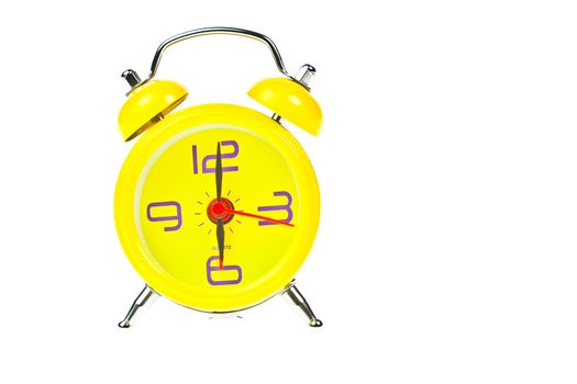 Clock, Yellow clock, showing nine o'clock, Isolated