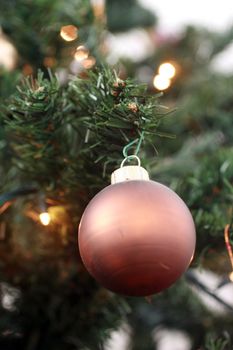 bronze bauble on a christmas tree